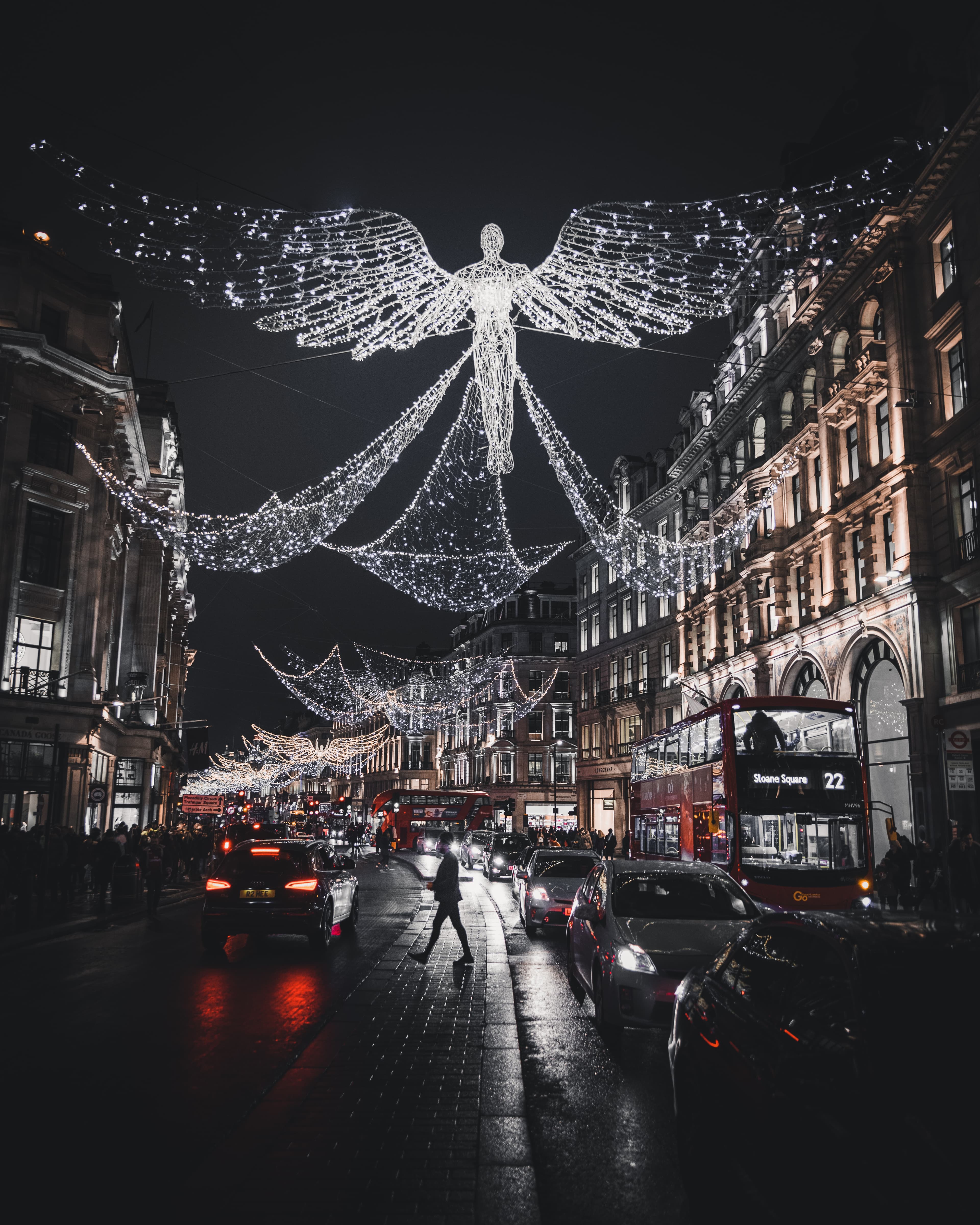 bright lights hanging over city street at night